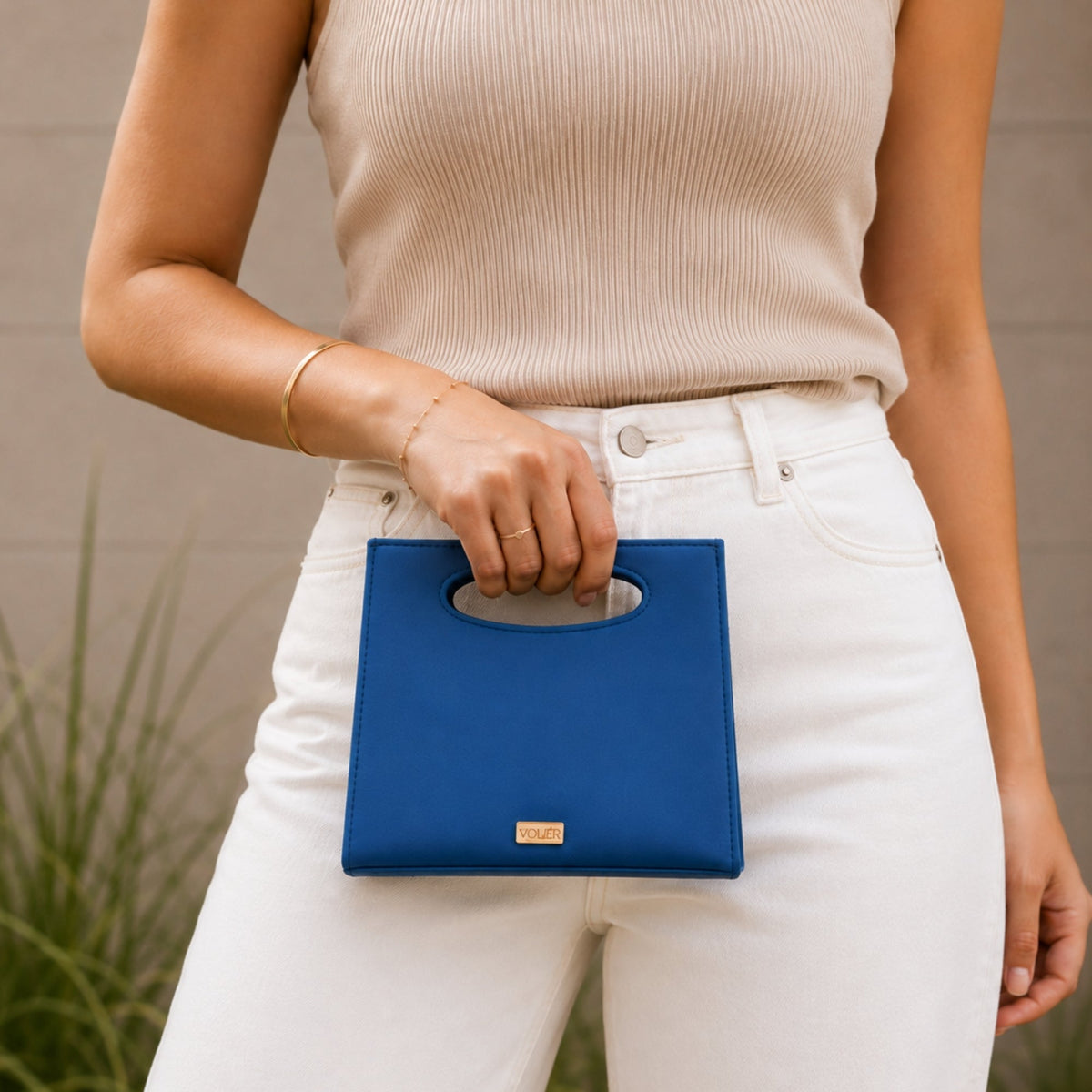 Cartera Vela Azul — Caucho natural de shiringa, hecho a mano en Perú - Quranteby
